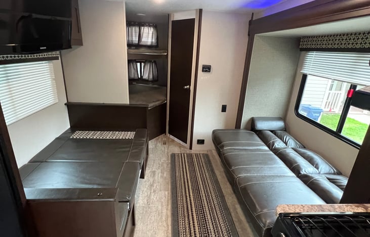 Plenty of walking room even with the table and couch turned into sleeping areas!