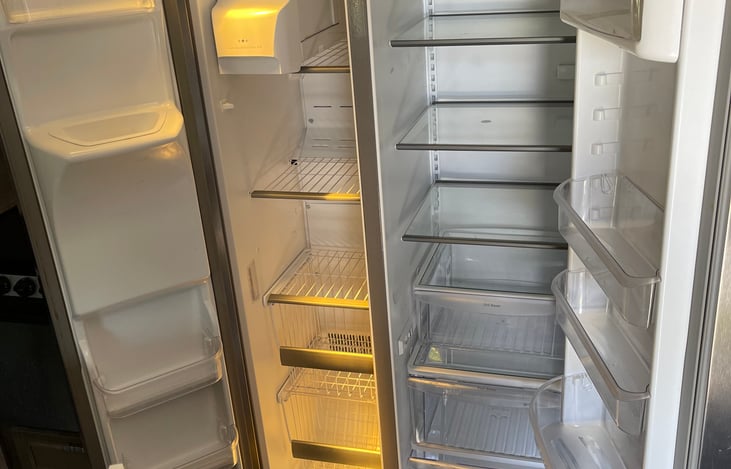 Full residential fridge . Ice maker and water built in. Plenty of room for food and beverages.