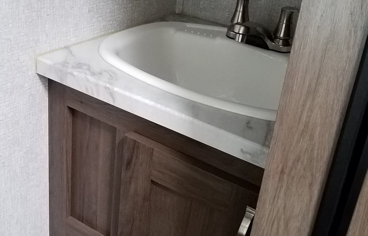 Bathroom Sink is conveniently located outside bathroom door