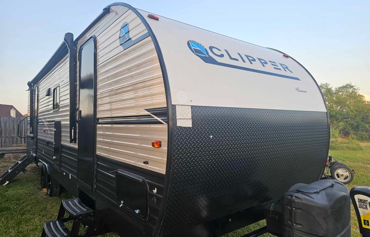 Large 16 foot adjustable awning allows for blocking that hot Texas sun as needed. Outdoor grill and fridge easily accessible. Two entry doors to allow for private entry to the bedroom.