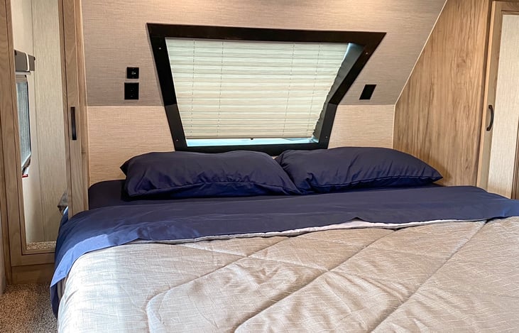 The front bedroom has a king size bed.