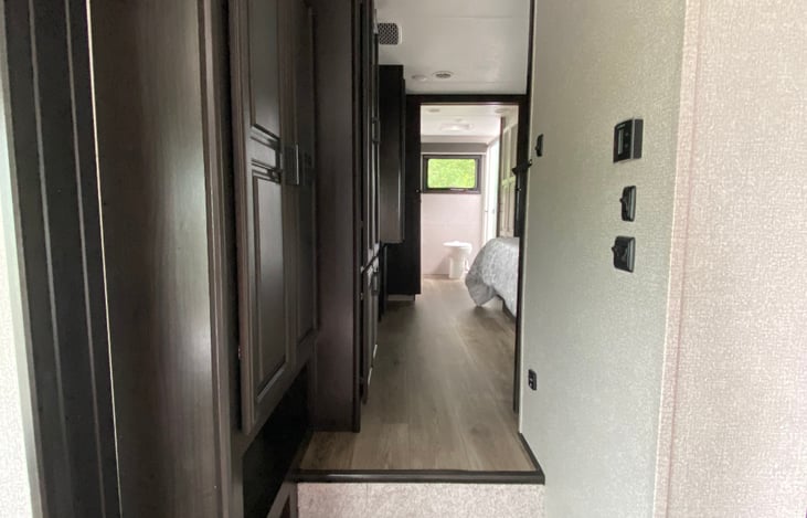 Looking from Kitchen to rear bedroom and large bathroom.