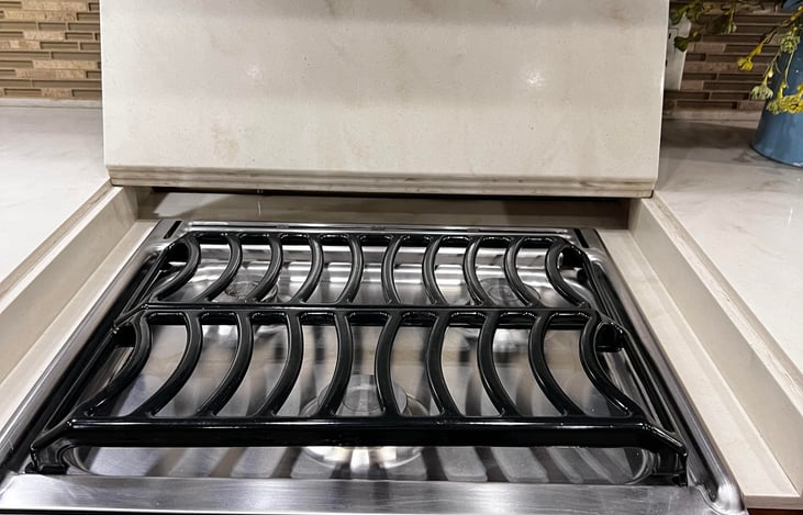 The 36GH Tiffin boasts a 3-gas burner stove top, providing versatile cooking options for meal preparation while traveling.