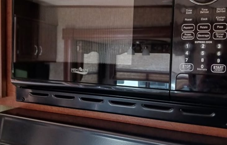 Microwave with turntable.