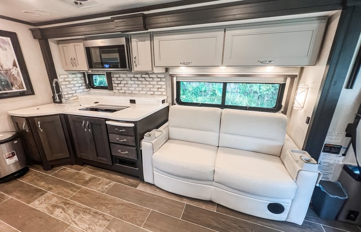 Spacious living area with modern amenities and plenty of natural light