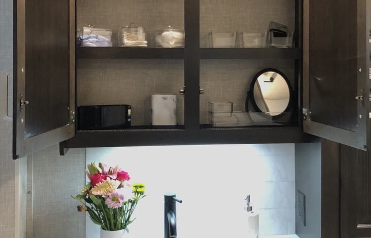 Plenty of storage in main bathroom cabinets.