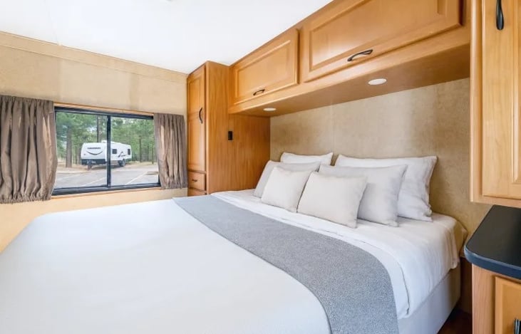 Recharge after the beats at EDC festival — comfortable RV bedroom for 6, pet friendly, and ready for your next night of fun