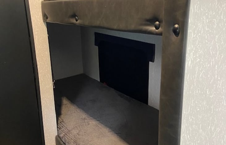 Bunkbeds that can be converted to storage for clothes, luggage, or other items.