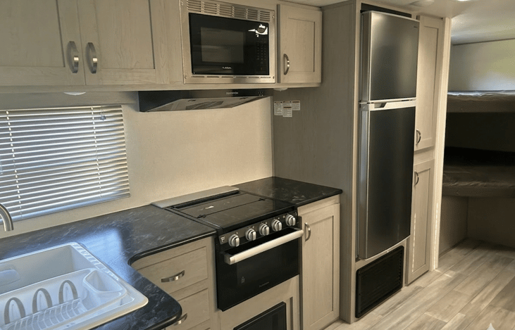 Oven, stove, microwave, fridge and freezer