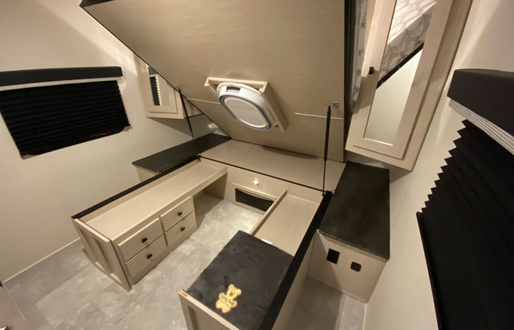 Bed shown vaulted up with underbed storage