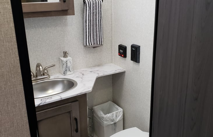 The bathroom comes stocked w/ RV toilet paper