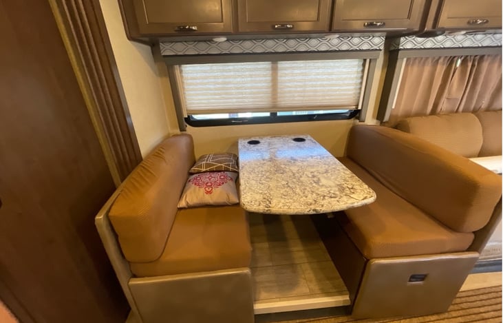 Dinette will collapse to a bed also.