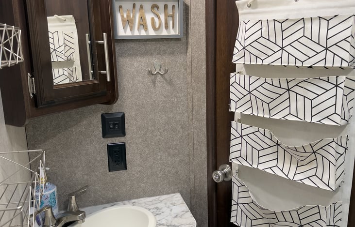 Bathroom with lots of storage options.