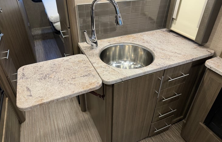 Kitchen sink and extra counter