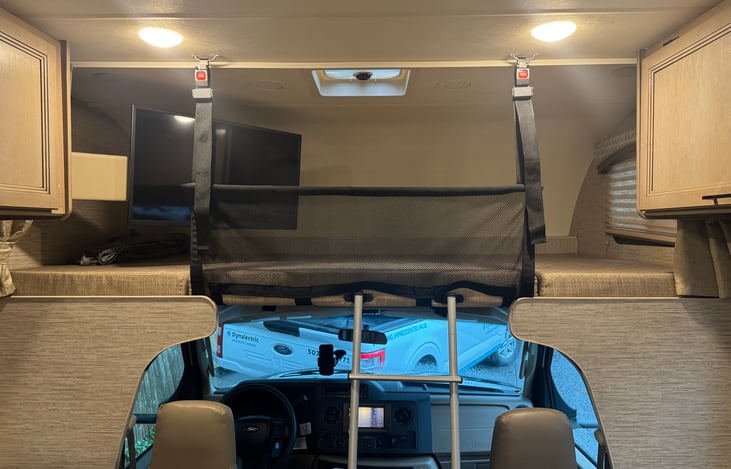 over cab bed, with TV extended