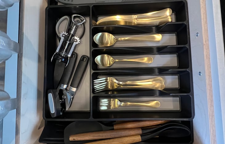 Utensils, cutlery, for every conceivable need provided.