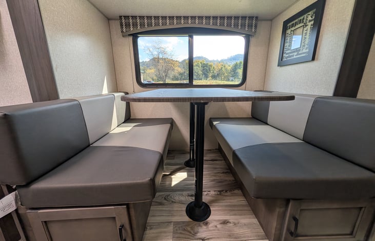Smart layout featuring a chef’s rear galley and a slide-out dinette with a huge panoramic window. Enjoy great meals, natural light, and scenic views in a surprisingly spacious interior!