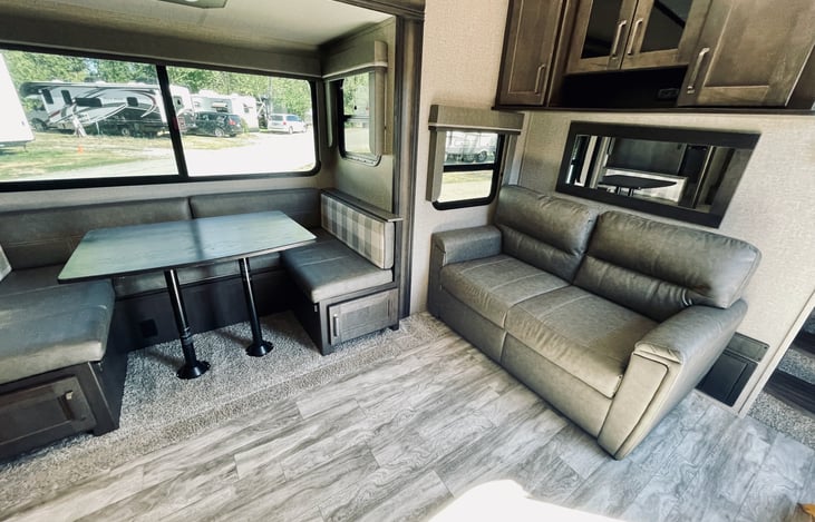 Love seat that converts into a (not so conformable) bed.