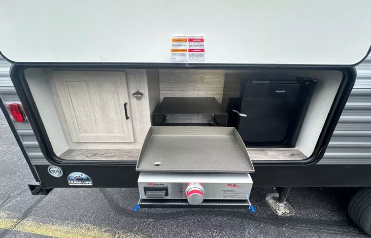 Outdoor gas grill and beer cooler