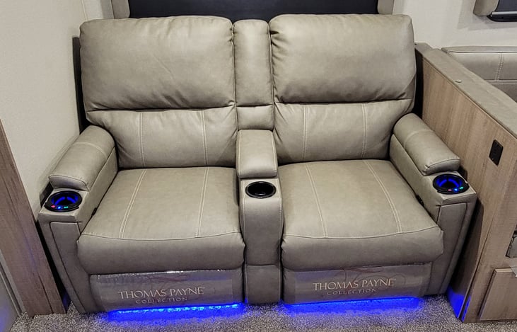 Theater seats with heat/massage and lighted cupholders.