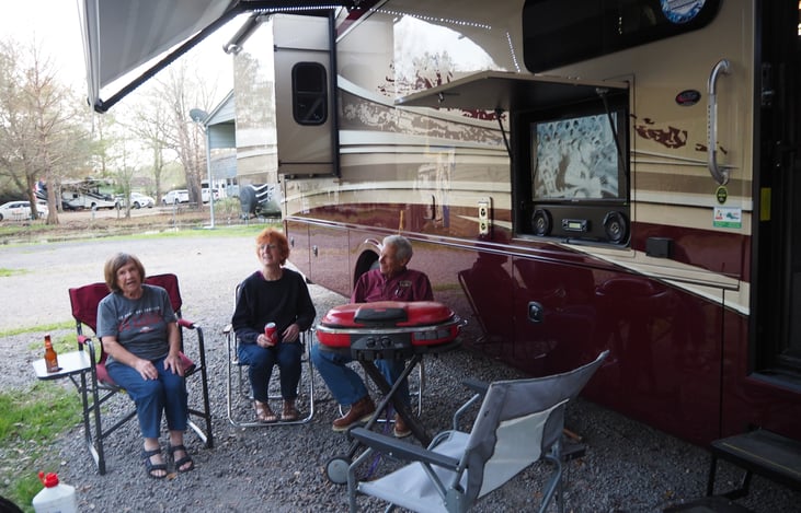 Sitting around the BBQ with friends