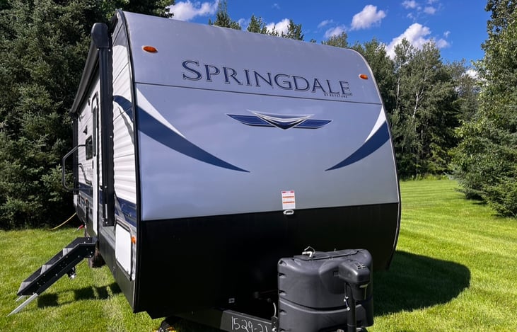 Front view with propane tanks