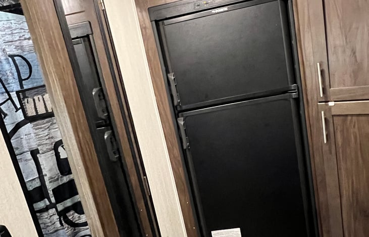 Full refrigerator and freezer.