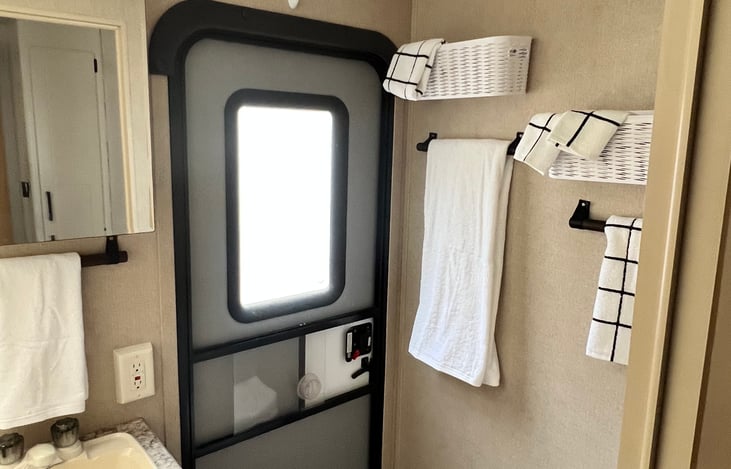 Bathroom with exterior door.