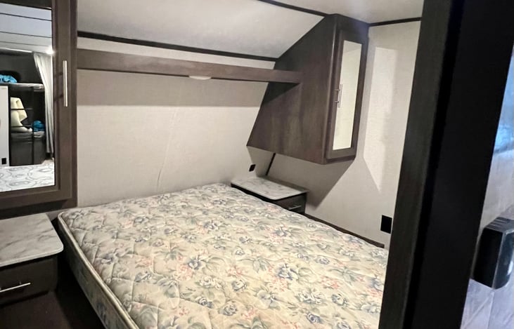 Bedroom behind the fireplace