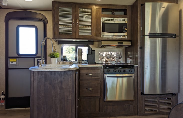 Kitchen, complete with a Keurig machine, toaster, pots, pans, etc.
