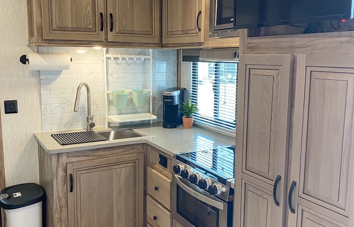 Kitchen is fully stocked with everything you need, including keurig coffee maker and K cups.