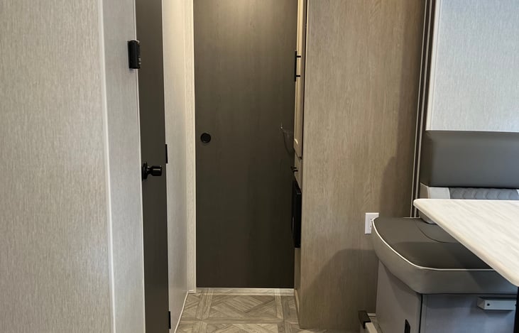 This door closes fully and leads into the kids Bunk house room