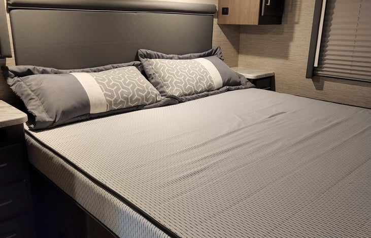 King Size Bed in the Rear of of RV