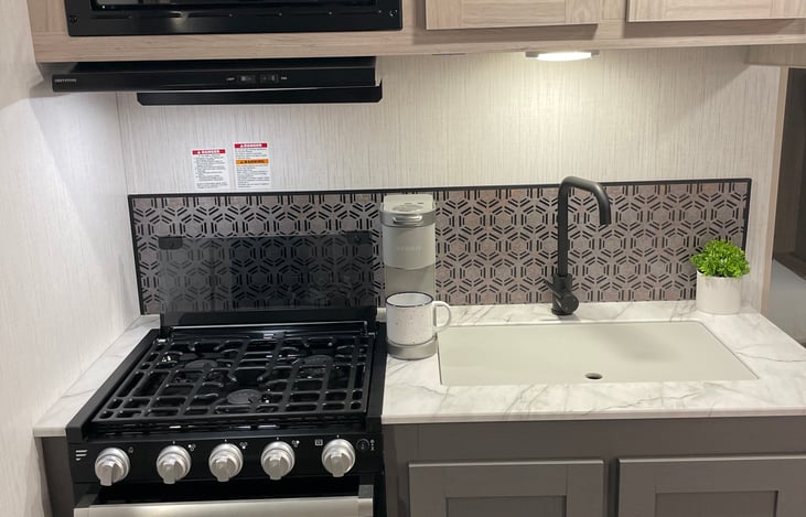 Enjoy extra amenities such as a cup of coffee from our Keurig  mini.