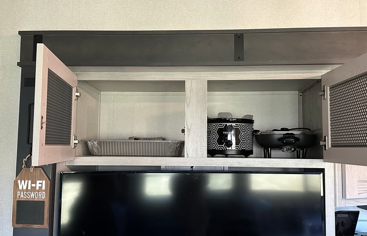 Storage above living room TV