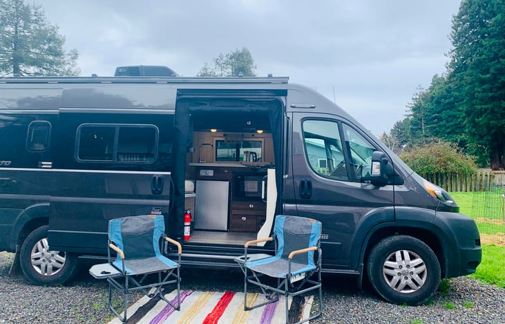 passenger side open, folding chairs & outside rug included