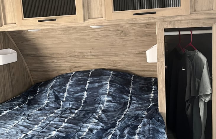 Queen size bed with a memory foam bed topper that makes for an excellent night's sleep!