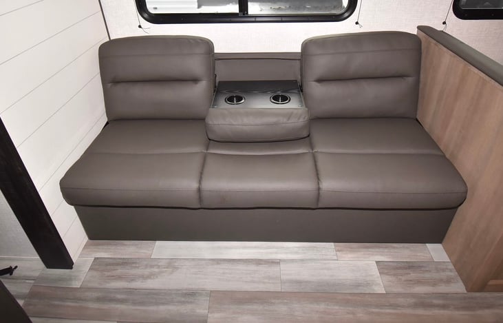 Sofa bed with cup holder
