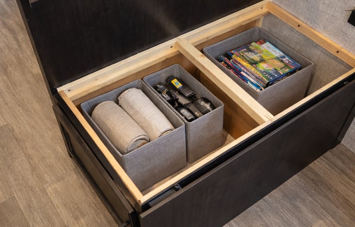 Storage under the seats for the dinette