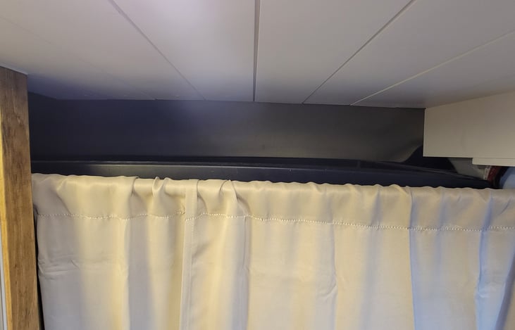 Plenty of storage about front seats