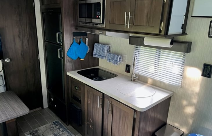 Separate Fridge and Freezer , 2 Burner Stove, Microwave, Dish towels and cloths