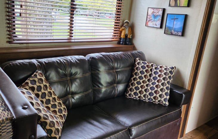 Sofa sleeps 1 comfortably