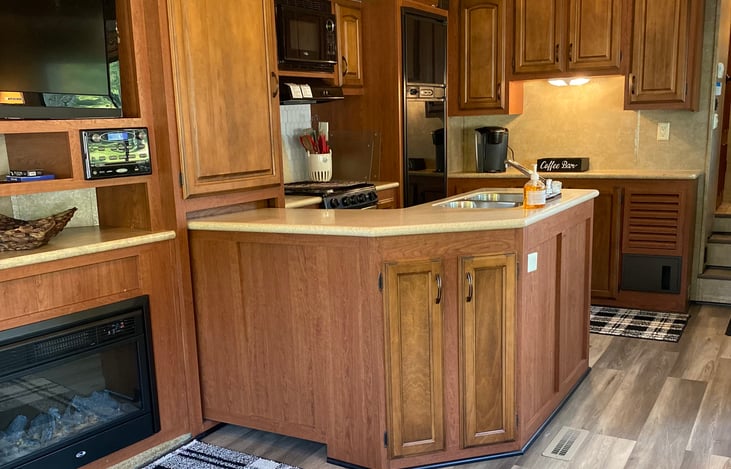 Fully stocked RV kitchen.
