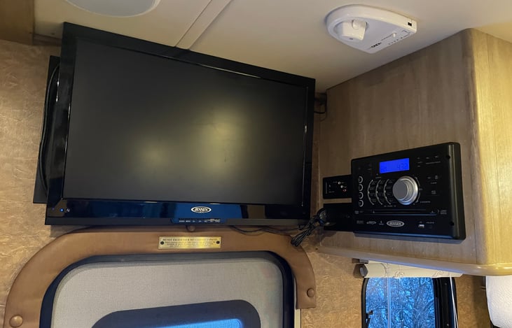 Let the kids watch a movie on the road.