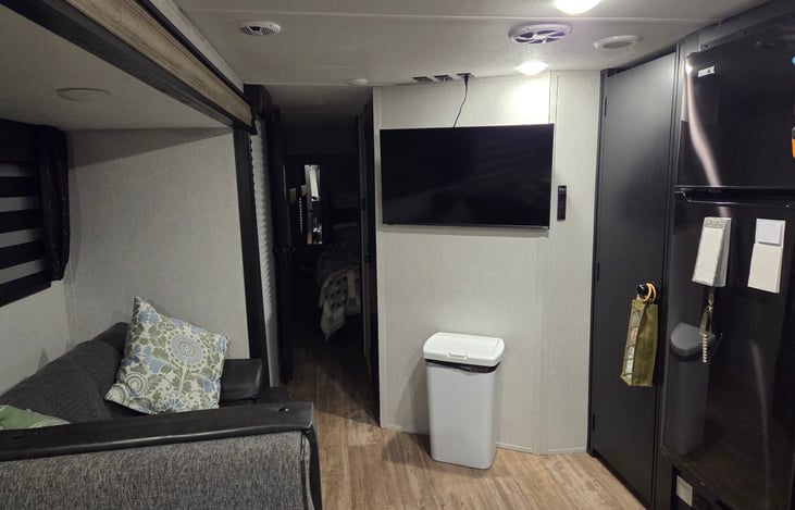 View of general living area w/ 40 in. TV