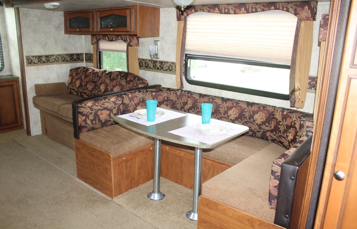 Table comfortably seats four, but with little ones, you can get cozy with five.