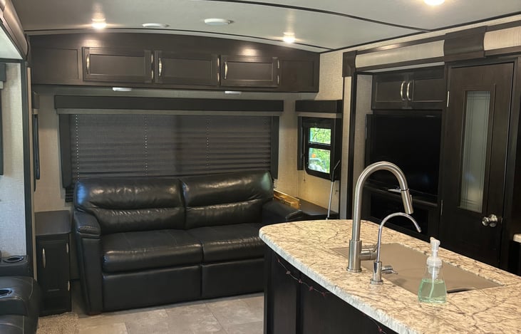 Couch pulls out to a full size bed with a matress topper available