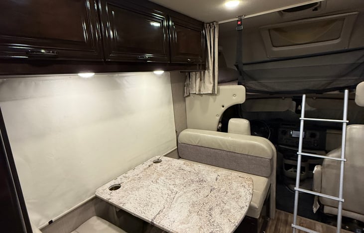 Over head bunk with detachable latter.