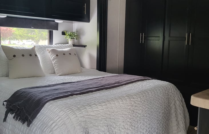 Comfortable queen bed in the master bedroom