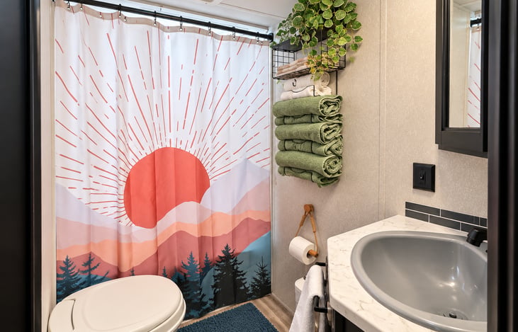 Bathroom with shower and plenty of towels!